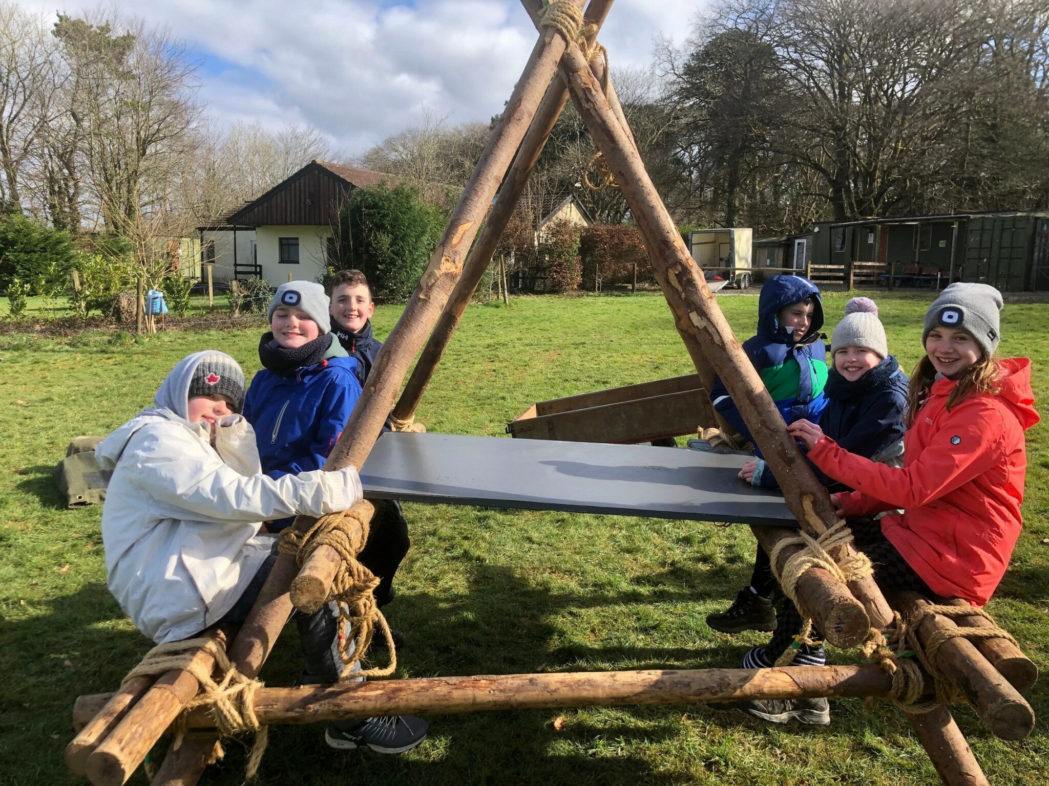 Scouts sitting on pioneering project
